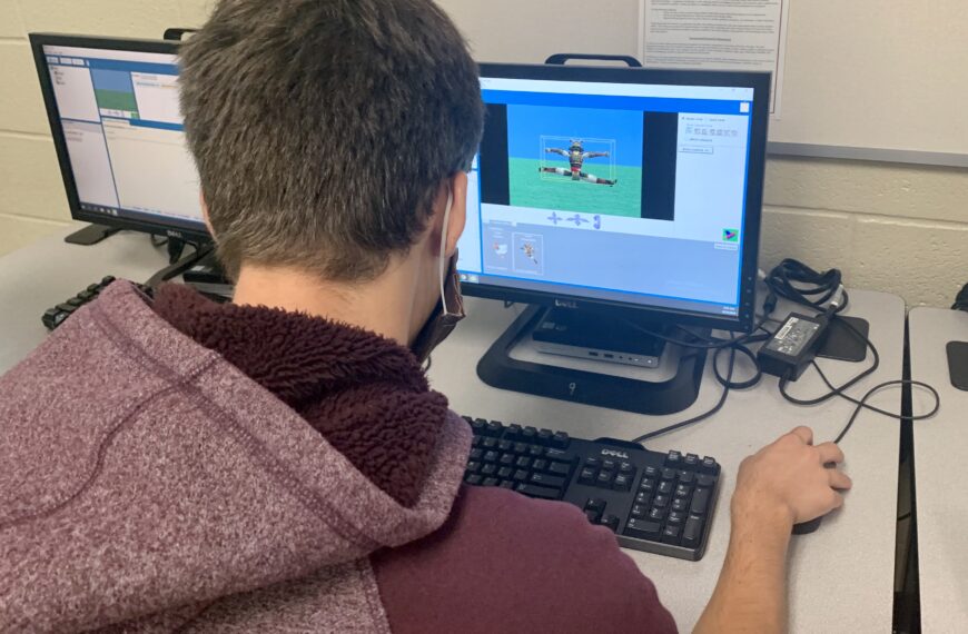 High school students learn computer coding and programming logic through series of computer sciences classes