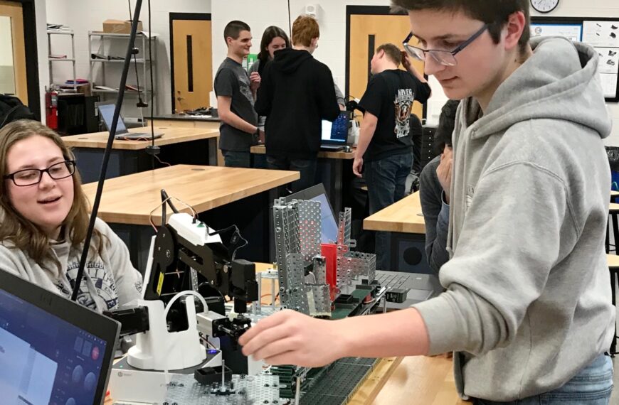 Students building automated assembly lines