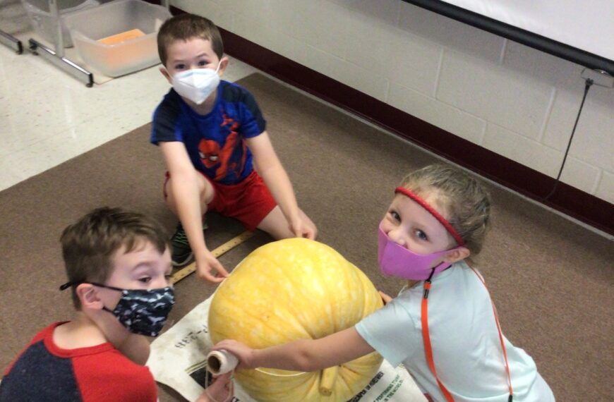 Oley Valley students estimate pumpkin weight for the fair