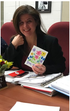 Students create flower arrangements and cards for board directors